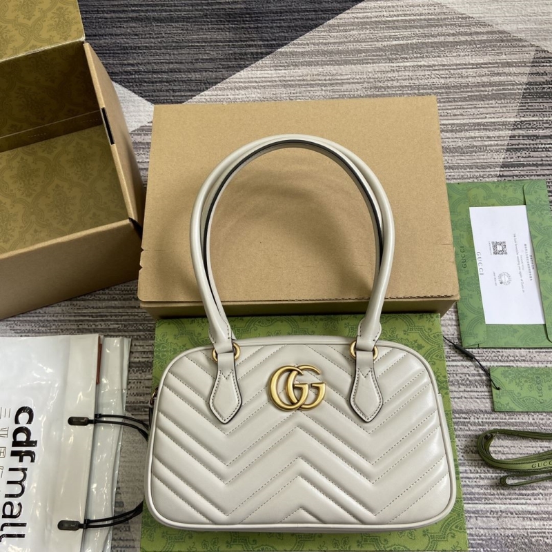 G*u*i top handle bags